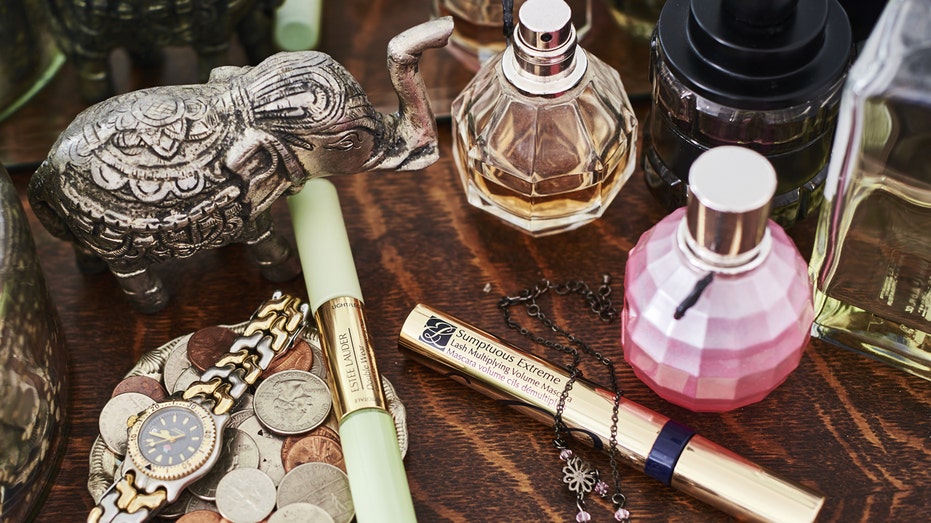 Estee Lauder products arranged on a desk 
