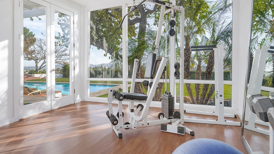 The gym is found in a pavilion near the pool.