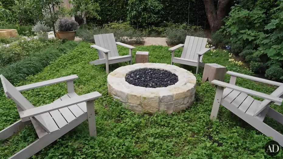 Outside the library is the firepit, which is surrounded by clover.