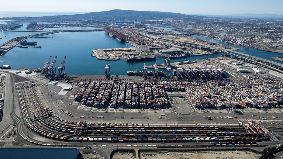 LOS ANGELES, CA - OCTOBER 16: Aerial view of containers waiting at Port of Long Beach to be loaded onto trains and trucks on October 16, 2021 in Long Beach, California. (Photo by Qian Weizhong/VCG via Getty Images)