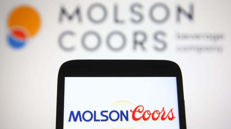 Molson Coors logo on smartphone