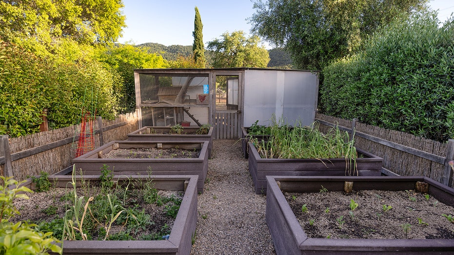 The home has a garden which also features a chicken coop.