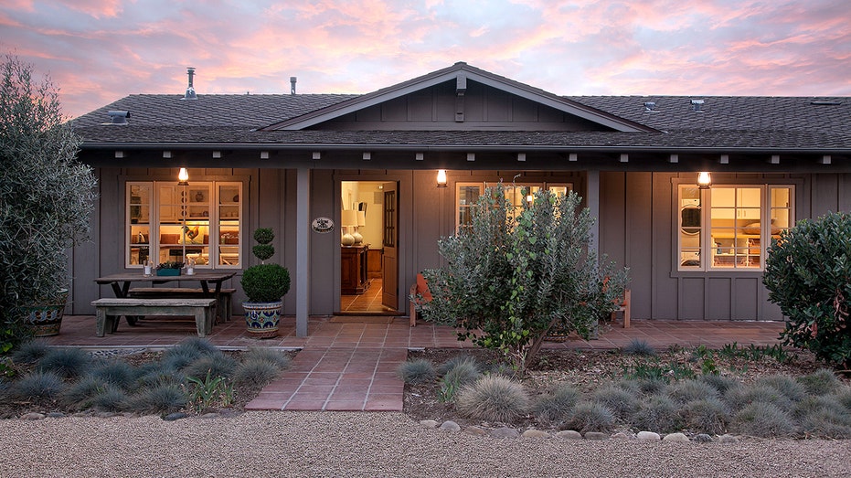 Behind the house is a guest house with two additional bedrooms.