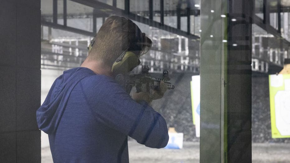 man shooting at a range