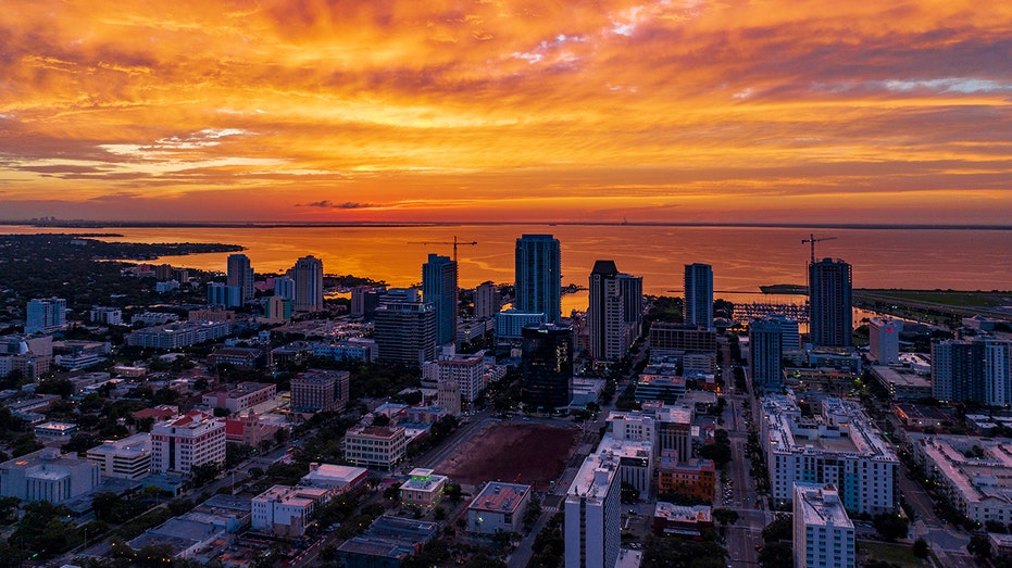 Sunrise on St. Petersburg Florida facing Atlantic Ocean explodes into orange color. (Photo by: Joe Sohm/Visions of America/Universal Images Group via Getty Images)