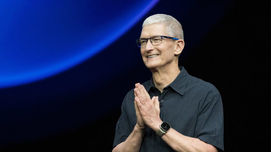 Tim Cook speaks on stage