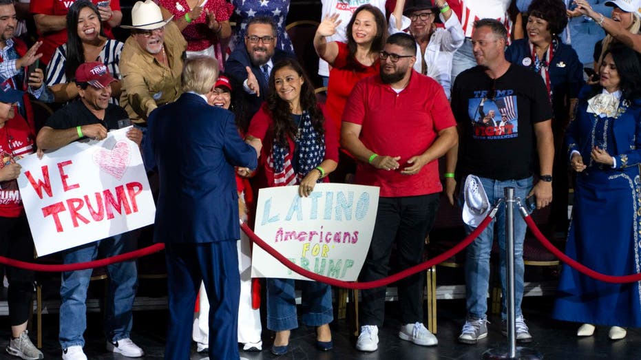 trump greeting supporters at Arizona rally