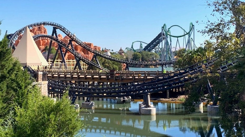 The Jurassic World VelociCoaster can be seen from many locations throughout the Universal theme park in Orlando, Florida, including the bridge connecting Jurassic Park and the Wizarding World of Harry Potter. (Dewayne Bevil/Orlando Sentinel/Tribune News Service via Getty Images)