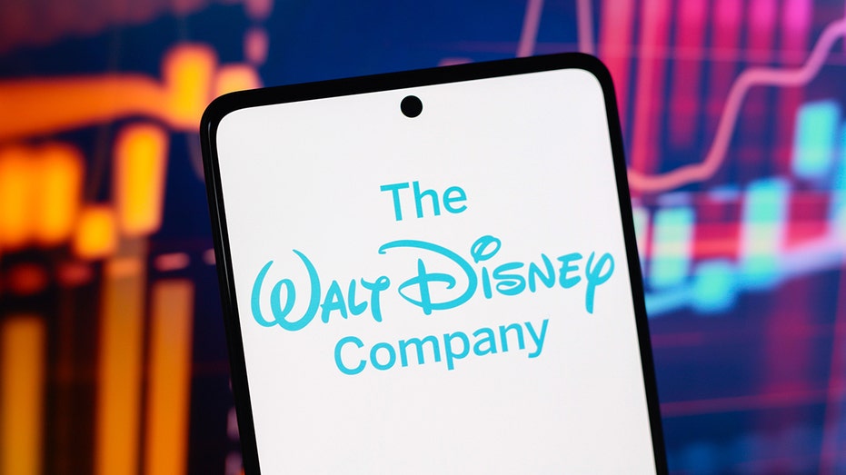 Disney logo on smartphone with colorful background