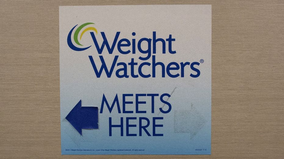 WeightWatchers meet here sign