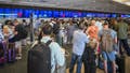 ORLANDO, FLORIDA - JULY 19: Passengers wait on long queues at check-in counters due to the global communications outage caused by CrowdStrike at Orlando International Airport on July 19, 2024, in Orlando, Florida. Businesses and airlines worldwide continue to be affected by a global technology outage attributed to a software update administered by CrowdStrike, a cybersecurity firm whose software is used by various industries around the world. - Fox News