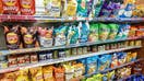 Miami Beach, Florida, convenience store junk food potato chips snack food display.