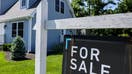 Patchogue, N.Y.: A For Sale sign hangs in front of a house in Patchogue, New York, on June 1, 2024.