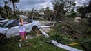 Marie Cook reacts to the damage to her home in the Binks Estates community after a tornado touch down around 5:30pm striking homes in The Preserve and Binks Estate among others in its path Oct. 09, 2024 in Wellington.