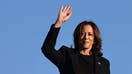 CHARLOTTE, NORTH CAROLINA - OCTOBER 05: Democratic presidential nominee, Vice President Kamala Harris waves before boarding Air Force Two after assessing the Hurricane Helene recovery response in North Carolina on October 5, 2024 in Charlotte, North Carolina. Harris was briefed on recovery operations at the Charlotte Air National Guard Base, visited a donation drop-off site for storm victims and met with impacted families. According to the Vice President&rsquo;s office, 74 percent of people who lost electricity during the storm now have power restored. 