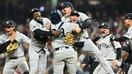 CLEVELAND, OHIO - OCTOBER 19: The New York Yankees celebrate after beating the Cleveland Guardians 5-2 in 10 innings to win Game Five of the American League Championship Series at Progressive Field on October 19, 2024 in Cleveland, Ohio. (Photo by Jason Miller/Getty Images)
