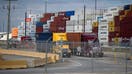 Trucks line up outside of the Bayport Container Terminal at the port of Houston in Seabrook, Texas, US, on Friday, Oct. 4, 2024. US dockworkers agreed to end a three-day strike that had paralyzed trade on the US East and Gulf coasts and threatened to become a factor in the presidential election. 