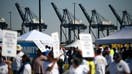 Dockworkers strike at the Bayport Container Terminal in Seabrook, Texas, on October 1, 2024. Officials at 14 ports along the US East and Gulf Coasts were making last-minute preparations on September 30 for a likely labor strike that could drag on the US economy just ahead of a presidential election -- despite last-minute talks.