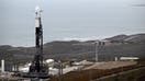 A SpaceX Falcon 9 rocket stands on a launch pad with the Surface Water and Ocean Topography (SWOT) satellite from NASA and France&apos;s space agency CNES at the Vandenberg Space Force Base in Lompoc, California on December 15, 2022. - SpaceX delayed the launch of the satellite to early December 16, 2022, needing more time to investigate moisture in two of the rocket&apos;s nine first-stage Merlin engines. 