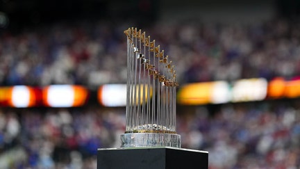 ARLINGTON, TX - MARCH 28: A detail photo of the Commissioner's trophy prior to the game between the Chicago Cubs and the Texas Rangers at Globe Life Field on Thursday, March 28, 2024 in Arlington, Texas. (Photo by Cooper Neill/MLB Photos via Getty Images)
