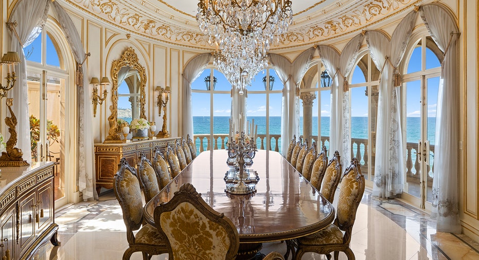 A 19th Century chandelier hangs above the dining room table