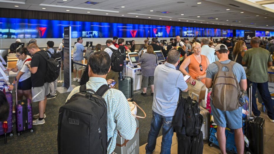 Airport terminal with travelers