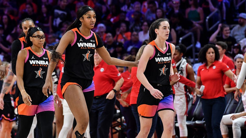 Angel Reese and Caitlin Clark during a WNBA game