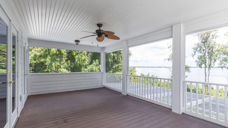 The porch overlooks the river and is spacious enough to act as an outdoor sitting area.