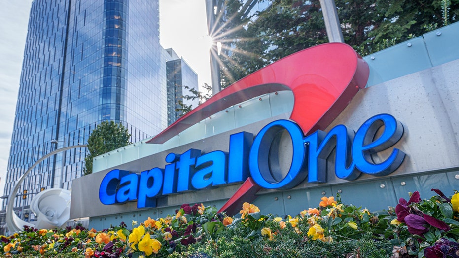 MCLEAN VA- FEBRUARY 08: The sun flares over the top of the Capital One logo outside of their corporate headquarters complex on February 8, 2024, in McLean, Va. (Photo by J. David Ake/Getty Images)