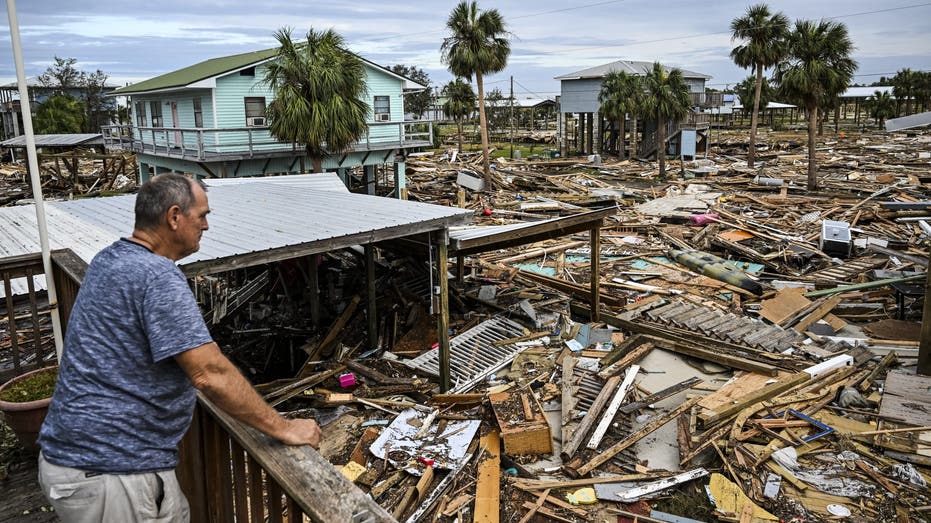 florida homeowner assesses damage after hurricane helene