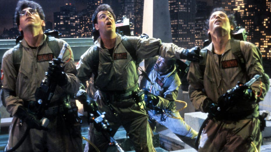 Harold Ramis, Dan Aykroyd, Ernie Hudson (background) and Bill Murray in a scene from the film Ghostbusters