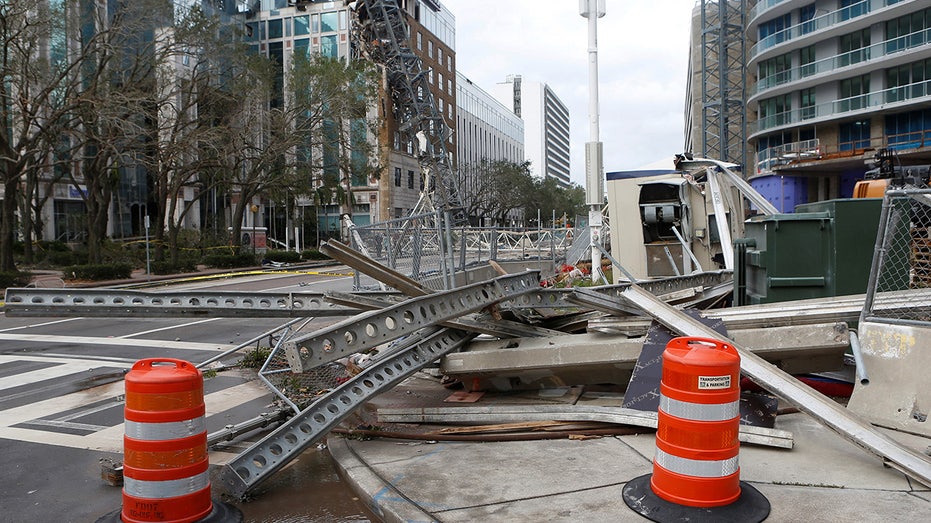 A view shows a collapsed construction crane that fell on the building that also hosts the offices of the Tampa Bay Times