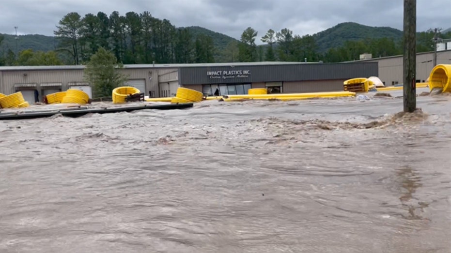 Floodwaters outside Impact Plastics