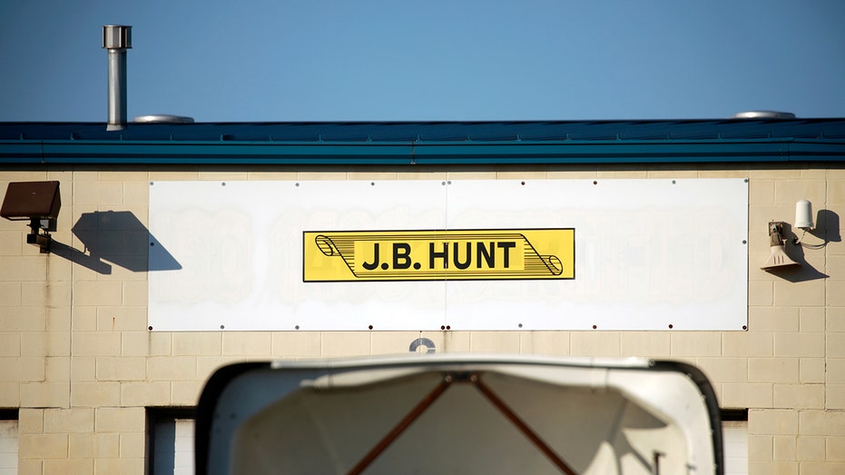 Signage outside a J.B. Hunt Transport Services Inc. freight depot in Indianapolis, Indiana, U.S., on Saturday, Jan. 15, 2022. J.B. Hunt Transport Services Inc. is scheduled to release earnings on January 18. Photographer: Luke Sharrett/Bloomberg via Getty Images