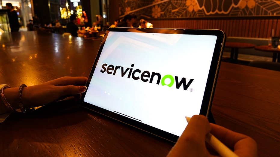 CHINA - 2024/09/21: In this photo illustration, a ServiceNow logo is displayed on the screen of a smartphone. (Photo Illustration by Sheldon Cooper/SOPA Images/LightRocket via Getty Images)