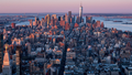 The Manhattan skyline is seen at sunrise from the 86th floor observatory of the Empire State Building on April 3, 2021, in New York City. - Fox News