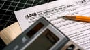 NORTH HALEDON, NJ - APRIL 15: In this photo illustration, a 1040 U.S. Individual Income Tax Return document is seen on a desk on April 15, 2024 in North Haledon, New Jersey. 