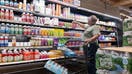 NEW YORK, NEW YORK - JULY 11: People shop at a grocery store in Brooklyn on July 11, 2024 in New York City. Stocks rose on Thursday following a morning report by the Bureau of Labor Statistics showing that inflation eased more than expected in June. 