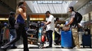 Travelers gather with their luggage in the international terminal at Los Angeles International Airport (LAX) on June 25, 2024 in Los Angeles, California.  - Fox Business News