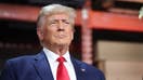  Republican presidential candidate former President Donald Trump speaks to guests during a campaign stop at Drake Enterprises, an automotive parts manufacturer, on September 27, 2023 in Clinton Township, Michigan. 