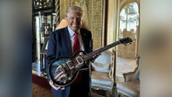 Trump unveils limited edition 'American Eagle' acoustic and electric guitars