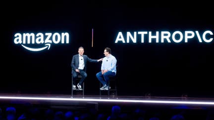 LAS VEGAS, NEVADA - NOVEMBER 28: Amazon Web Services (AWS) CEO Adam Selipsky speaks with Anthropic CEO and co-founder Dario Amodei during AWS re:Invent 2023, a conference hosted by Amazon Web Services, at The Venetian Las Vegas on November 28, 2023 in Las Vegas, Nevada. 