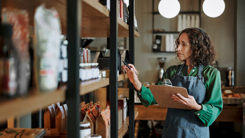 Business owner taking inventory