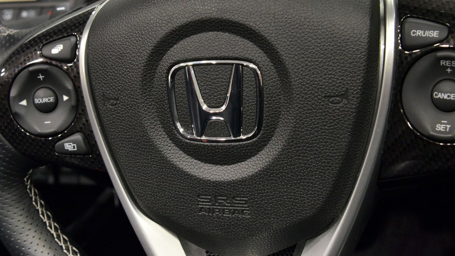 Close-up on Honda steering wheel