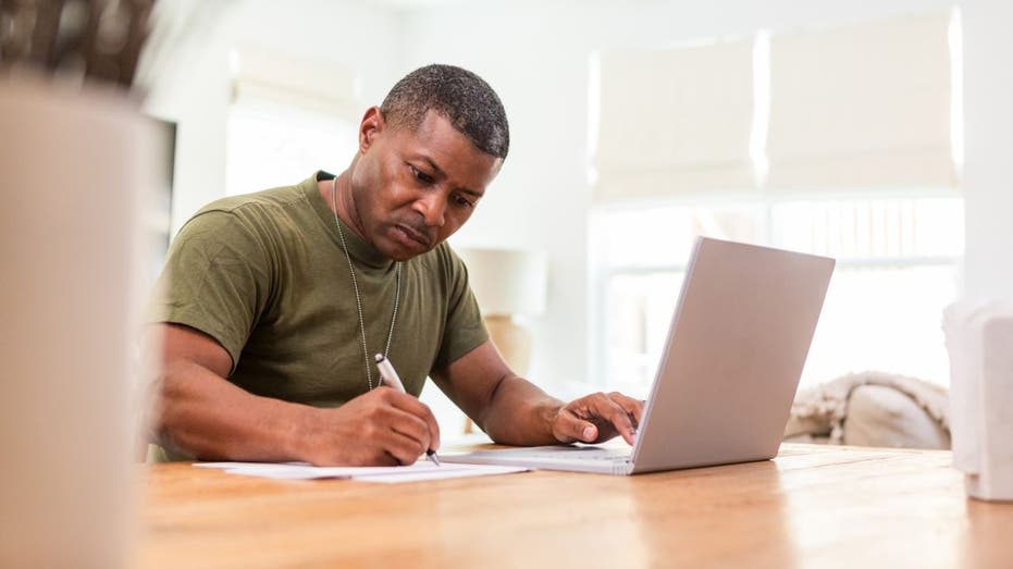 Veteran looking at computer