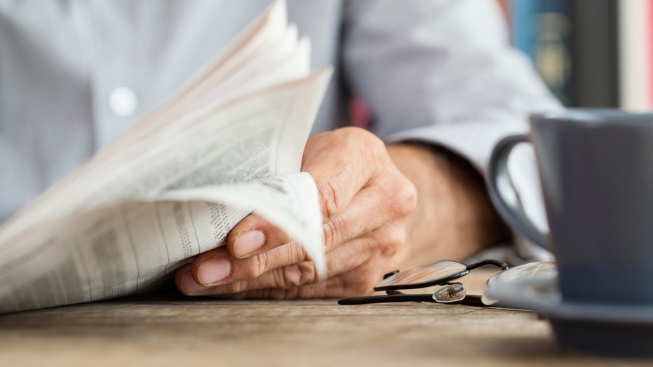 A man reading a newspaper