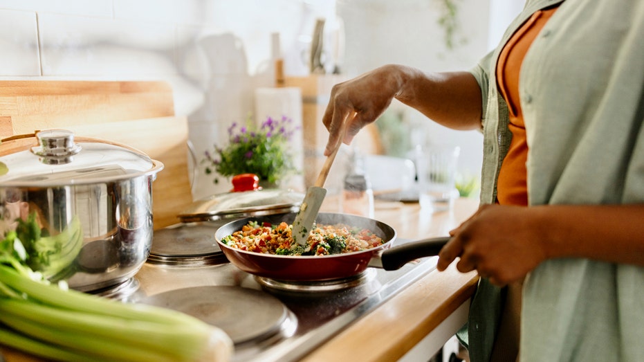 Woman cooking in kitchen