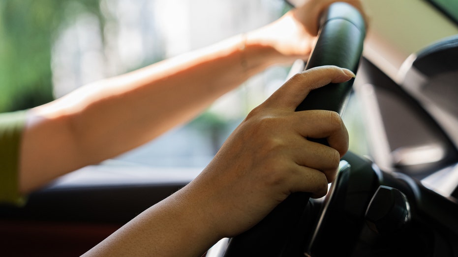 A woman driving a car