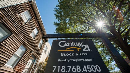 A Century 21 Real Estate LLC "For Sale" sign hangs in front of a property in the Park Slope neighborhood of the Brooklyn borough of New York, U.S., on Tuesday, Sept. 17, 2013. The National Association of Realtors is scheduled to release existing home sales figures on Sept. 19. Photographer: Craig Warga/Bloomberg via Getty Images