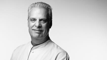 French chef Eric Ripert of the US' three-stars Michelin restaurant 'Le Bernardin' in New York poses during a photo session in Paris on November 25, 2024. 